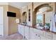 Bathroom with double vanity and granite countertop at 507 Casey Key Rd, Nokomis, FL 34275