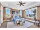 Bright bedroom with large windows and a comfy bed at 507 Casey Key Rd, Nokomis, FL 34275