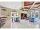 Bright dining area with hardwood floors and coffered ceiling at 507 Casey Key Rd, Nokomis, FL 34275