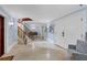 Grand entryway with curved staircase and light blue walls at 507 Casey Key Rd, Nokomis, FL 34275