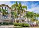 Grand two-story home with palm trees and landscaping at 507 Casey Key Rd, Nokomis, FL 34275