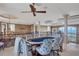 Game room featuring a poker table and ocean views at 507 Casey Key Rd, Nokomis, FL 34275