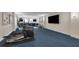 Well-equipped home gym featuring treadmill and elliptical at 507 Casey Key Rd, Nokomis, FL 34275