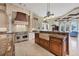 Gourmet kitchen featuring a farmhouse sink and high-end appliances at 507 Casey Key Rd, Nokomis, FL 34275
