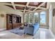 Spacious living room boasting arched windows and water views at 507 Casey Key Rd, Nokomis, FL 34275