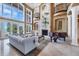 Spacious living room with high ceilings and ocean views at 507 Casey Key Rd, Nokomis, FL 34275