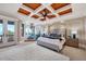 Bright main bedroom with a large bed and ocean views at 507 Casey Key Rd, Nokomis, FL 34275