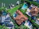 Aerial view of canal-front home with private dock at 508 Siesta Dr, Sarasota, FL 34242