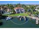 Waterfront property showcasing canal views and a private dock at 508 Siesta Dr, Sarasota, FL 34242