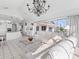 Open living space with white sofas and views of the water at 508 Siesta Dr, Sarasota, FL 34242