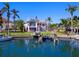 Waterfront home with private dock and lush landscaping, offering stunning views at 508 Siesta Dr, Sarasota, FL 34242