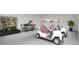 Well-equipped workshop with golf carts at 508 Siesta Dr, Sarasota, FL 34242