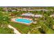 Aerial view of community pool, clubhouse, and playground at 5311 Tidewater Preserve Blvd, Bradenton, FL 34208