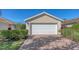 White garage door with brick paver driveway at 5862 Guarino Dr, Sarasota, FL 34238