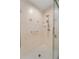 Clean and spacious walk-in shower with tile walls and built-in safety bar at 607 Marcus St # 27, Venice, FL 34285