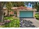 Charming one-story home with teal garage door and landscaped front yard at 607 Marcus St # 27, Venice, FL 34285