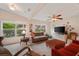 Cozy living room with comfortable seating, large windows, and tasteful decor at 607 Marcus St # 27, Venice, FL 34285
