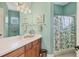 Guest bathroom with shower/tub combo and coastal decor at 6503 Moorings Point Cir # 202, Lakewood Ranch, FL 34202