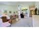 Bright living room with access to kitchen and patio at 7107 Heron Ct, Sarasota, FL 34243