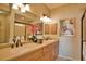 Elegant Primary bathroom with double sinks and large mirror at 800 San Lino Cir # 814, Venice, FL 34292