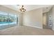 Spacious dining room with tile floors and a view of the pool at 8186 Shadow Pine Way, Sarasota, FL 34238