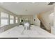 Kitchen island with sink and view into the Gathering room at 865 Molly Cir, Sarasota, FL 34232