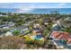 Luxury beachfront home with pool, gazebo, and lush landscaping at 8855 Midnight Pass Rd, Sarasota, FL 34242