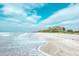 Beautiful beach with white sand and waves at 8855 Midnight Pass Rd, Sarasota, FL 34242