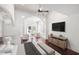 Main bedroom with sitting area and hardwood floors at 8855 Midnight Pass Rd, Sarasota, FL 34242