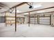 Two-car garage with storage shelves and ample space for parking at 8855 Midnight Pass Rd, Sarasota, FL 34242
