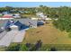 Aerial view of a single-story house with a large backyard and fenced perimeter at 9716 28Th E St, Parrish, FL 34219