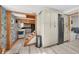 View of the kitchen with stainless steel appliances and white cabinetry at 105 Tucker Ave, Sarasota, FL 34232