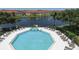 An aerial view of the community pool and surrounding buildings at 1130 Villagio Cir # 203, Sarasota, FL 34237