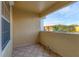 Spacious balcony with tile flooring and views of the surrounding community at 1130 Villagio Cir # 203, Sarasota, FL 34237