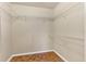 Walk-in closet with wire shelving provides ample storage space at 1130 Villagio Cir # 203, Sarasota, FL 34237
