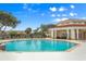 Inviting community pool with ample space for relaxation at 1130 Villagio Cir # 203, Sarasota, FL 34237
