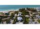 Aerial view of a beachside home nestled in a neighborhood at 116 50Th St, Holmes Beach, FL 34217