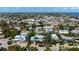 Aerial view showcasing a house's location in a residential neighborhood at 116 50Th St, Holmes Beach, FL 34217