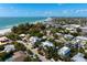 Aerial view showing a house's location near the beach at 116 50Th St, Holmes Beach, FL 34217