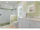 Bathroom with shower, toilet and vanity at 116 50Th St, Holmes Beach, FL 34217