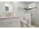 Bathroom with a shower, toilet and vanity at 116 50Th St, Holmes Beach, FL 34217