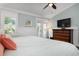 Serene bedroom with French doors leading to balcony at 116 50Th St, Holmes Beach, FL 34217
