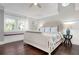 Bedroom with a large bed and window seat at 116 50Th St, Holmes Beach, FL 34217