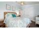 Bedroom with a bed and coastal decor at 116 50Th St, Holmes Beach, FL 34217