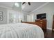 Spacious bedroom with dark hardwood floors and large windows at 116 50Th St, Holmes Beach, FL 34217
