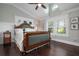 Main bedroom with hardwood floors and plantation shutters at 116 50Th St, Holmes Beach, FL 34217