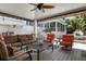 Outdoor patio furniture with a view of the pool and surrounding landscape at 116 50Th St, Holmes Beach, FL 34217
