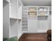 Bright walk-in closet with ample shelving and hanging space at 116 50Th St, Holmes Beach, FL 34217