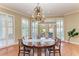 Bright dining room with hardwood floors and access to backyard at 124 Giralda Ne Blvd, St Petersburg, FL 33704