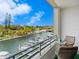 Balcony overlooking a canal with boats at 1709 N Tamiami Trl # A421, Sarasota, FL 34234